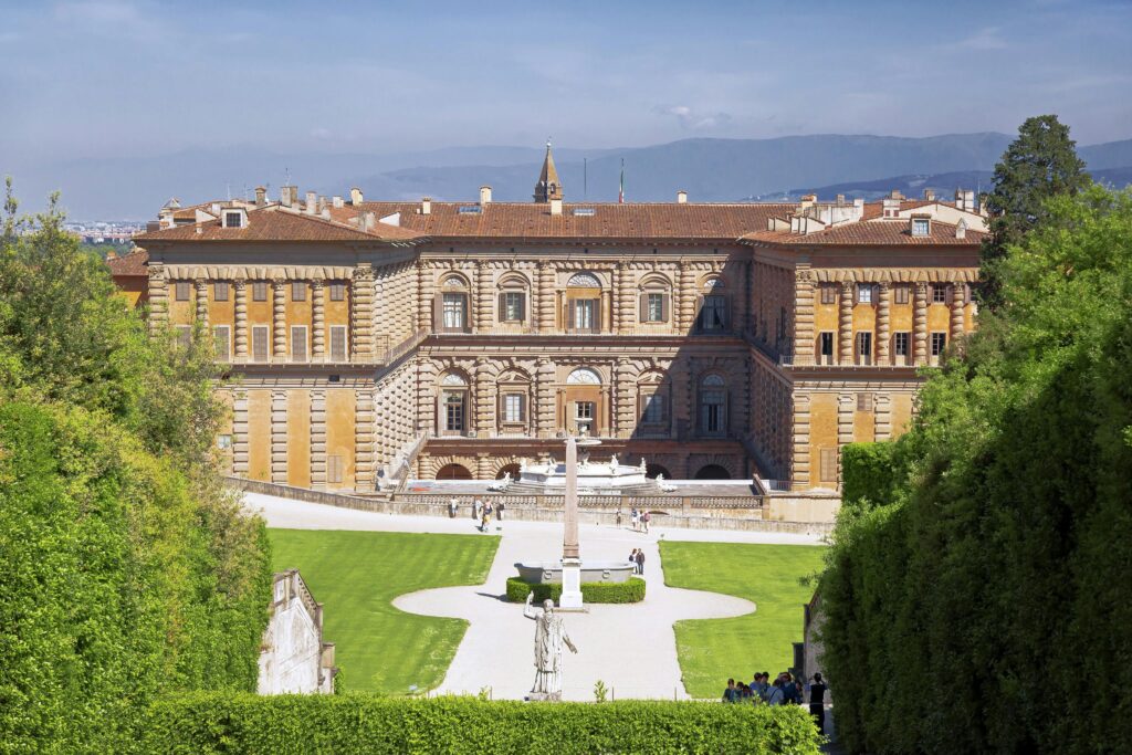 Pitti Palace and Boboli Gardens view, Florence, Italy. Formal gardens lead to the grand palace.